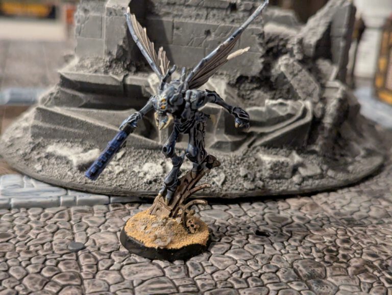Painted Vespid Stingwing standing on ruins