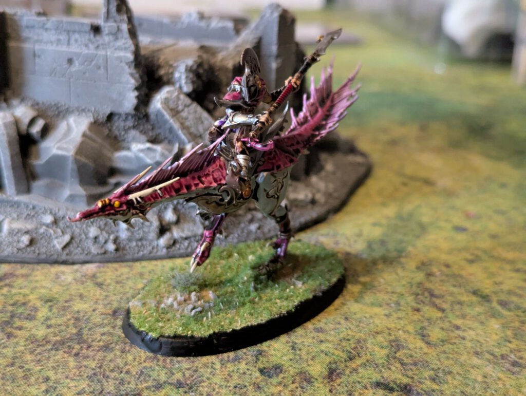 Painted Slickblade Seeker with extended glaive, front view.