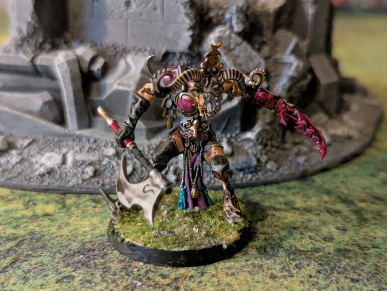 Painted Slaangor with axe, top-front angle.