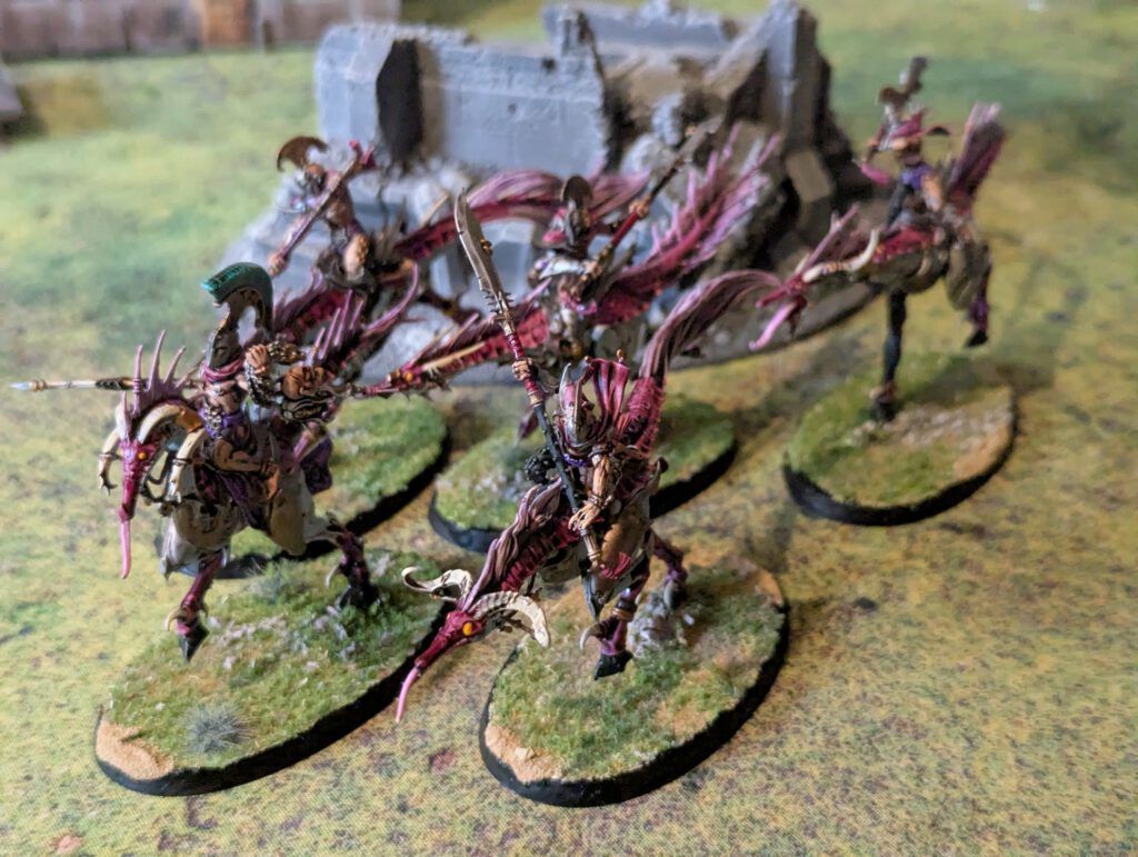 Painted Slickblade Seekers cavalry unit displayed together on their mounts, viewed from a top-front angle.