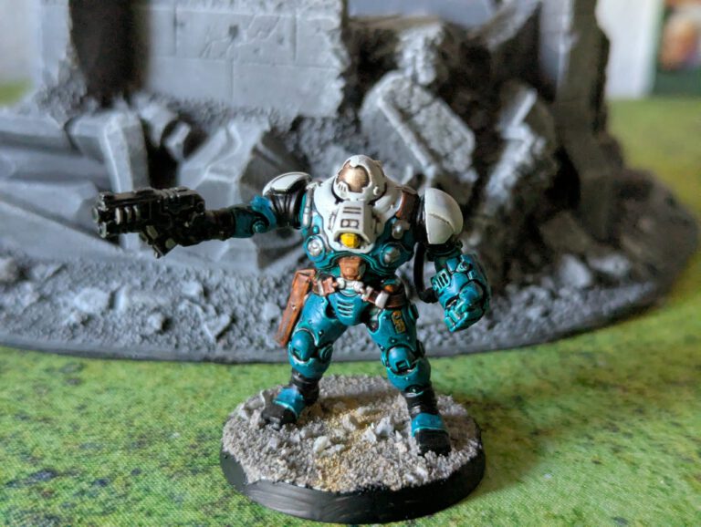 Painted Ironkin Steeljack with gauntlets in pose B, viewed from a top-front angle.