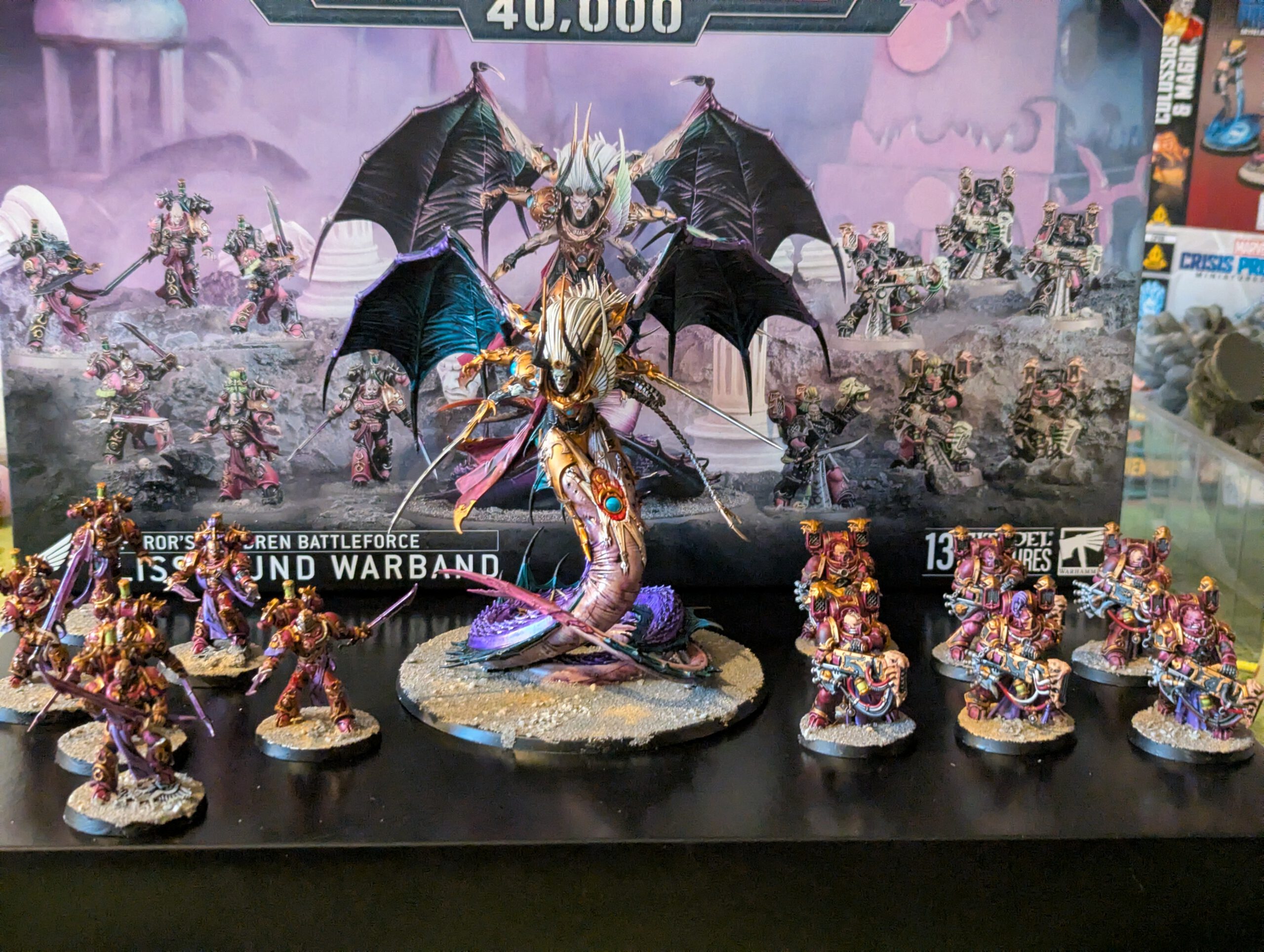 All thirteen painted Emperor’s Children Blissbound Warband miniatures displayed together, viewed from a slightly elevated front angle.