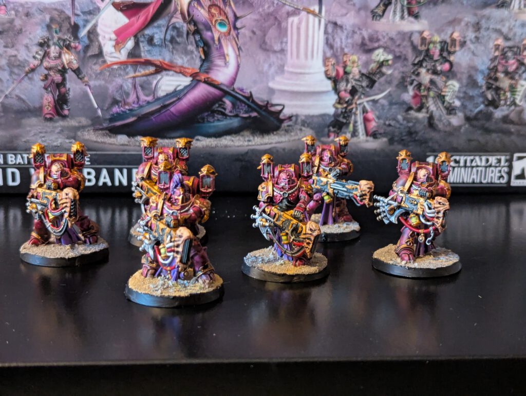 Painted Noise Marines squad of six, shown together from a front angle with sonic weapons visible.