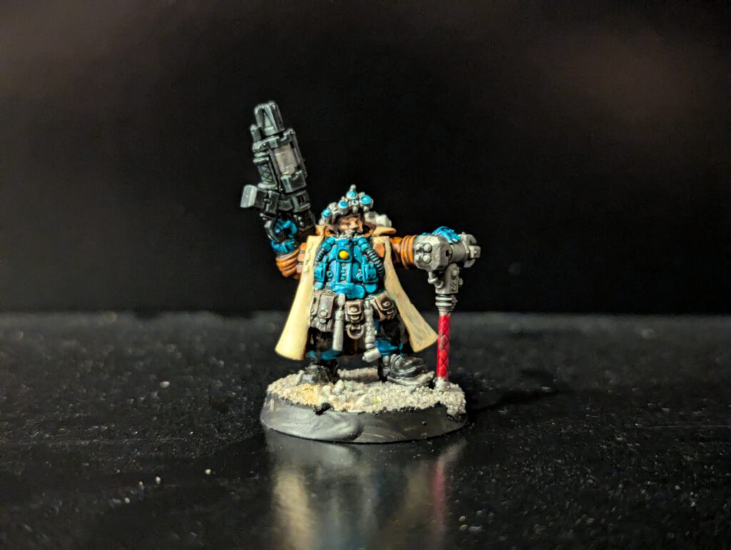 Painted Brokhyr Iron-Master with advanced armor and tools, viewed from a slightly elevated front angle.