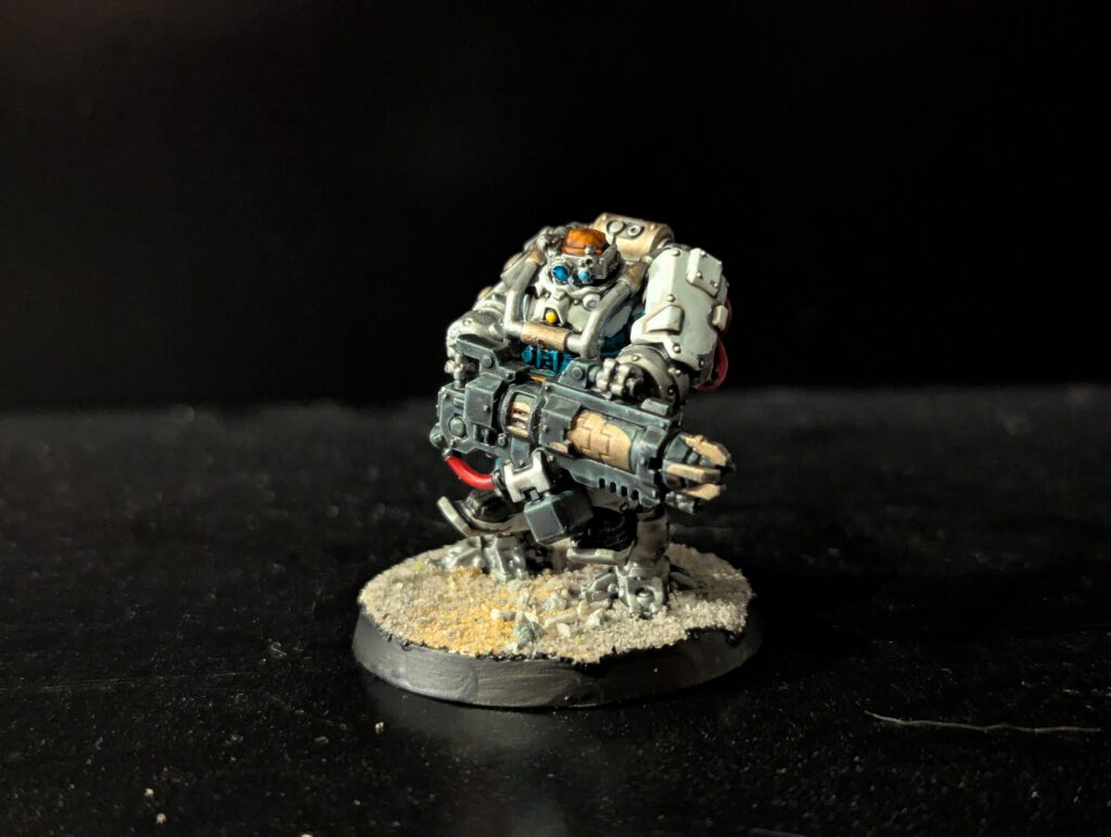 Painted Brokhyr Thunderkyn with industrial weapon and reinforced armor, viewed from a top-front angle.