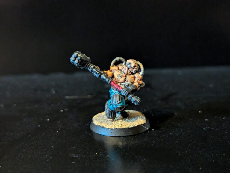 Painted Cthonian Berserk with mining hammer raised, viewed from a slightly elevated front angle.
