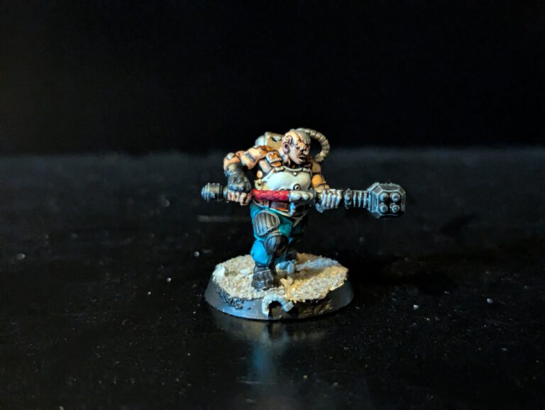 Painted Cthonian Berserk in an aggressive stance with hammer, viewed from a top-front angle.