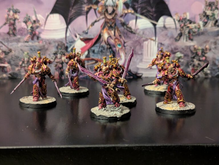 Painted Flawless Blades unit of six Emperor’s Children warriors, displayed together from a slightly elevated front view.
