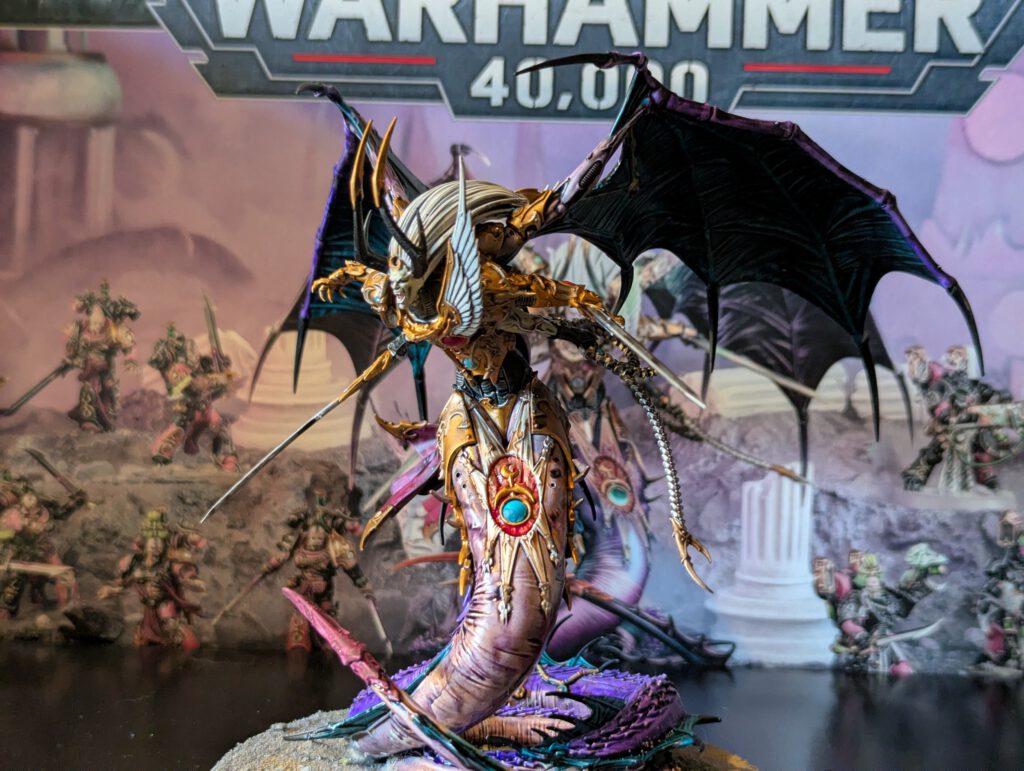 Painted Fulgrim from a slight right-front angle, highlighting cape, armor details, and blade.