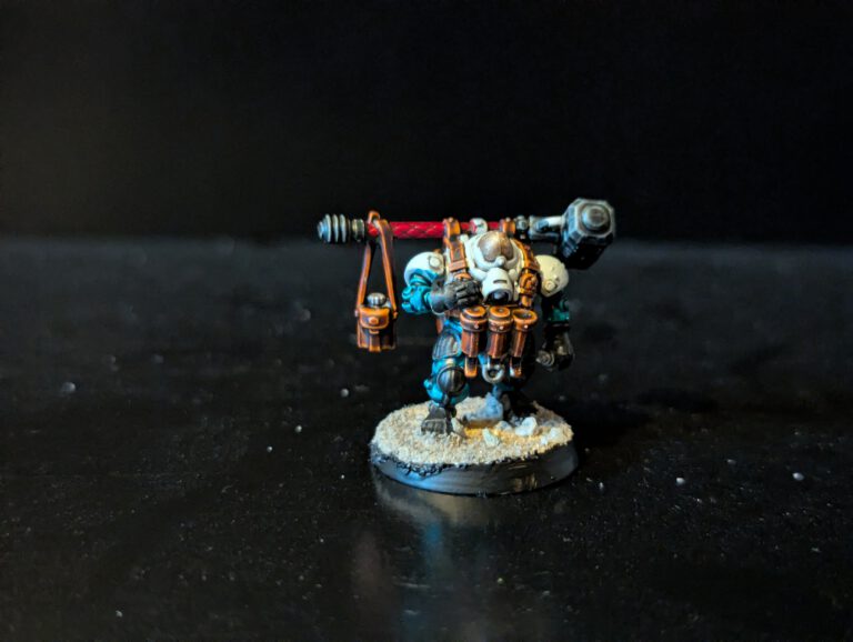 Painted Ironkin assistant on a separate base, viewed from a front angle.
