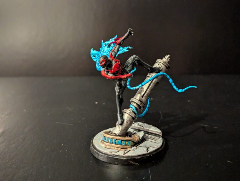 Painted Spider-Man 2099 miniature from Marvel Crisis Protocol, viewed from a top-front angle highlighting the futuristic suit design.