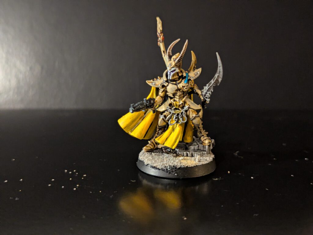 Painted Drukhari Archon character model, viewed from a slightly elevated front angle.
