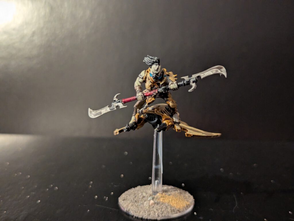 Painted Hellion in dynamic flying pose, viewed from a slightly elevated front angle.