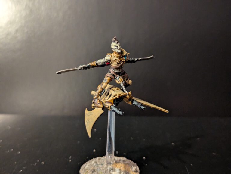 Painted Hellion with skyboard and glaive, viewed from a top-front angle.