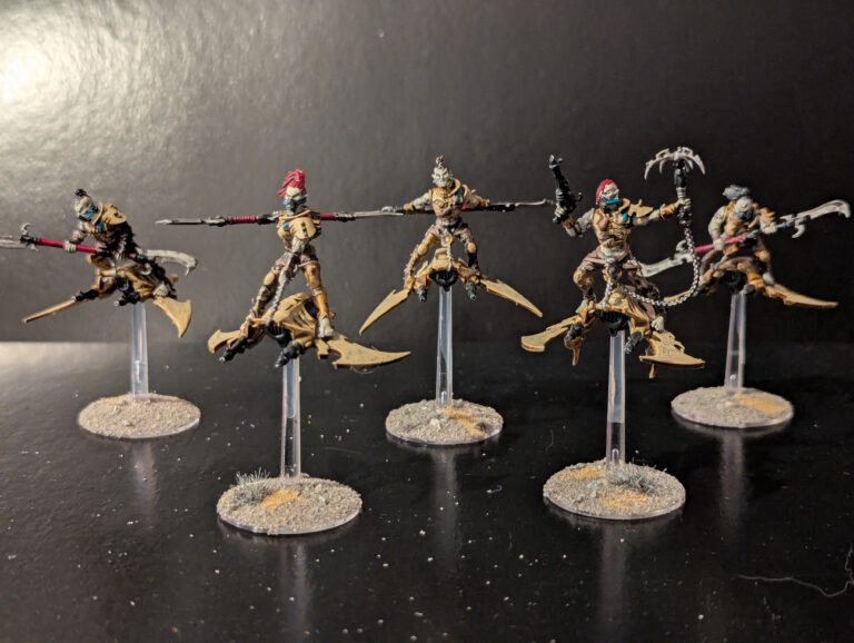 Painted Hellions squad mounted on skyboards, viewed from a top-front angle.