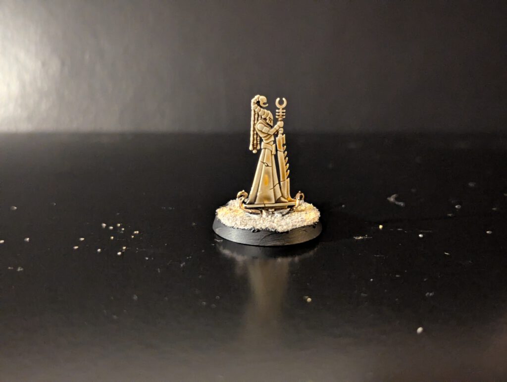 Painted Incubi shrine token displayed on its base, viewed from a top-front angle.