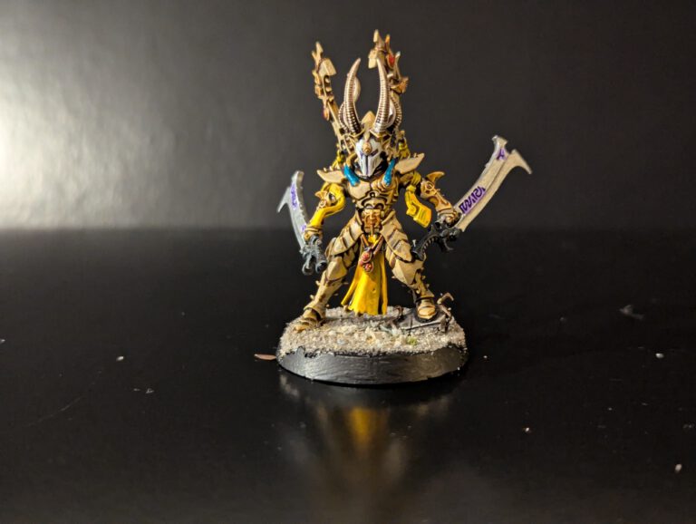 Painted Incubus advancing with klaives raised, viewed from a front angle.