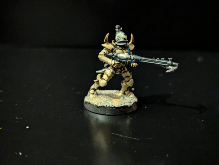 Painted Kabalite Warrior showcasing armor and weapon details, viewed from a slightly elevated front angle.