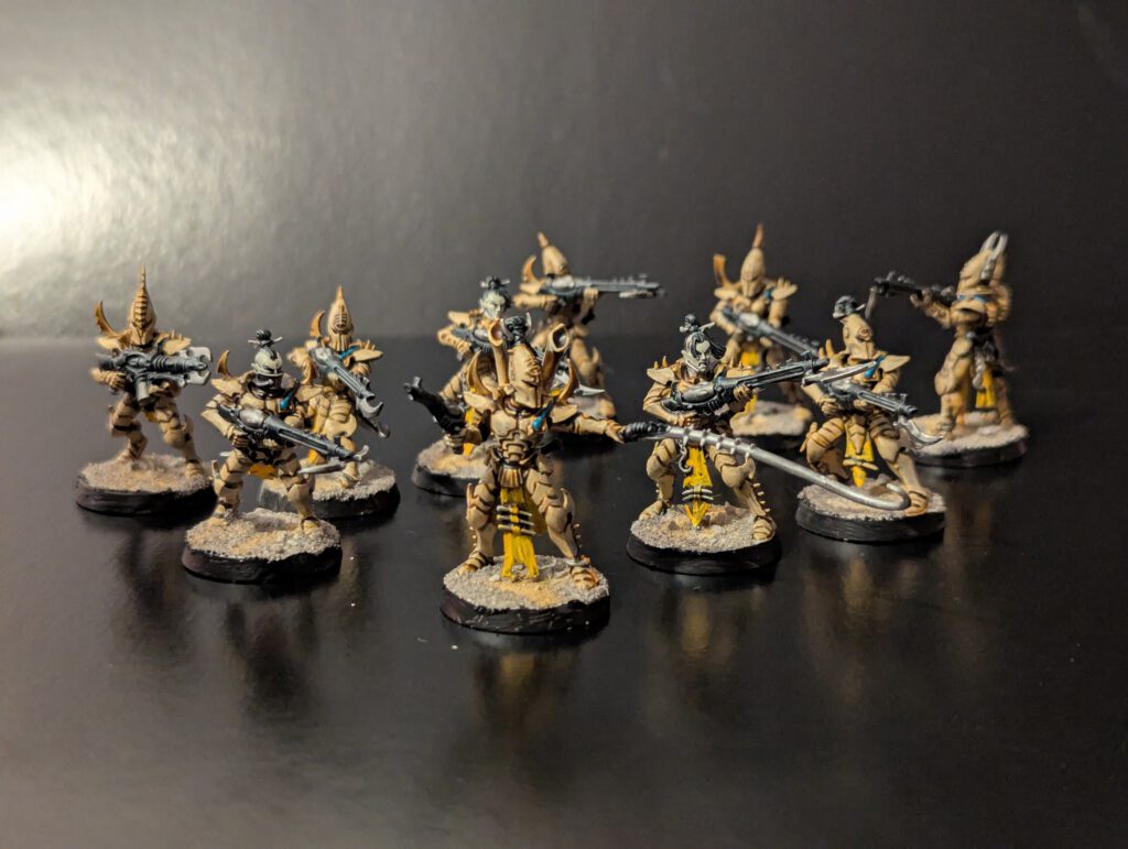 Painted Kabalite Warriors squad displayed together, viewed from a top-front angle.