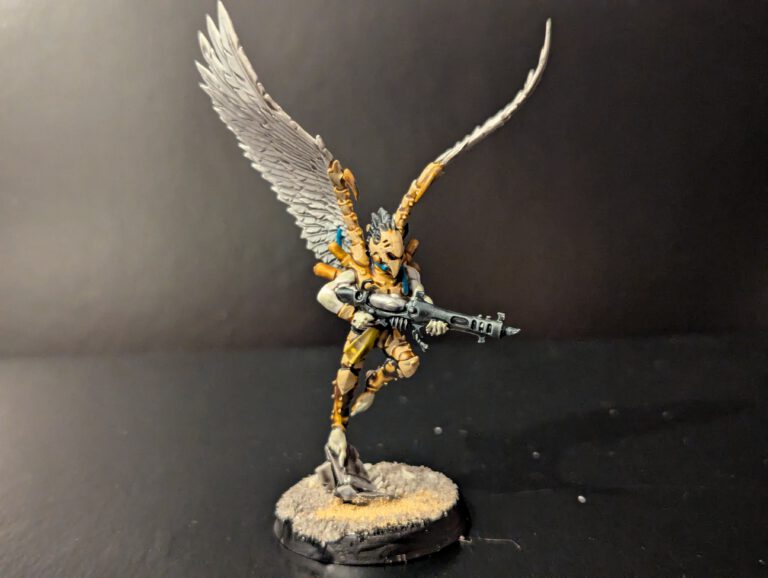 Painted Scourge in mid-flight pose, viewed from a slightly elevated front angle.