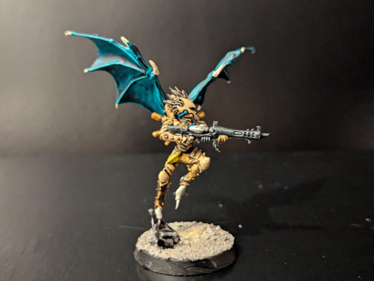 Painted Scourge showcasing wing and armor details, viewed from a top-front angle