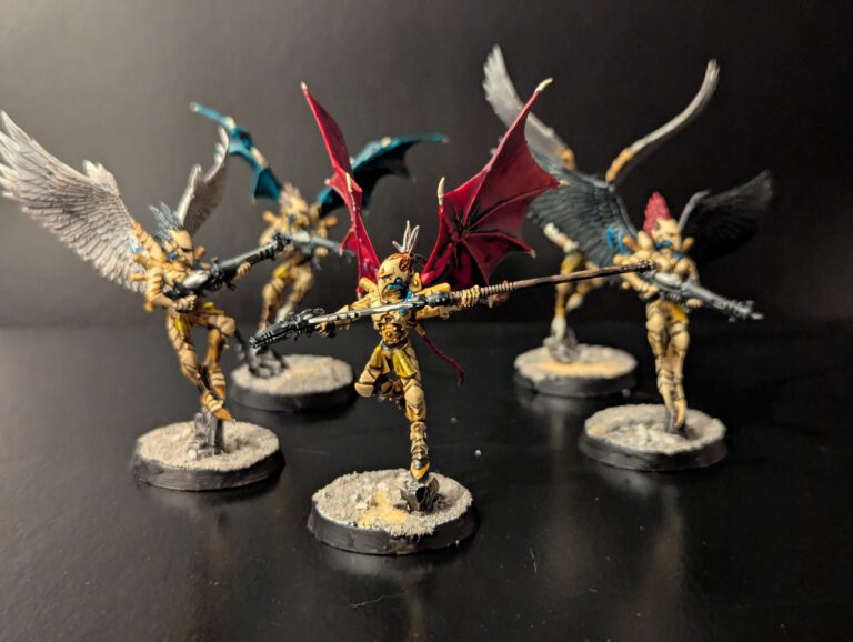 Painted Scourges squad displayed together, viewed from a top-front angle.