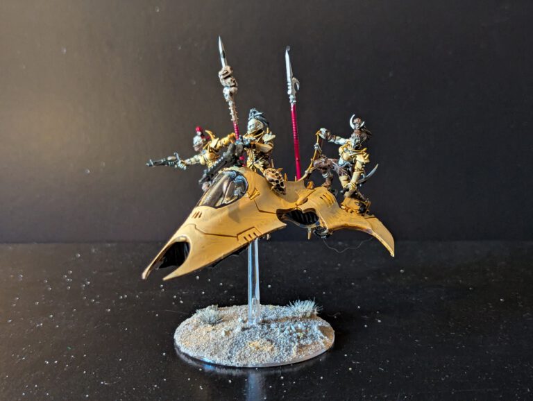 Painted Drukhari Venom transport viewed from the front-right angle.