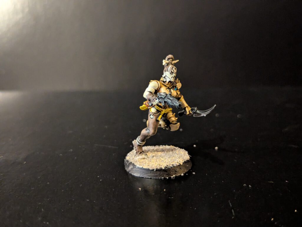 Painted Wych advancing aggressively, viewed from a slightly elevated front angle.