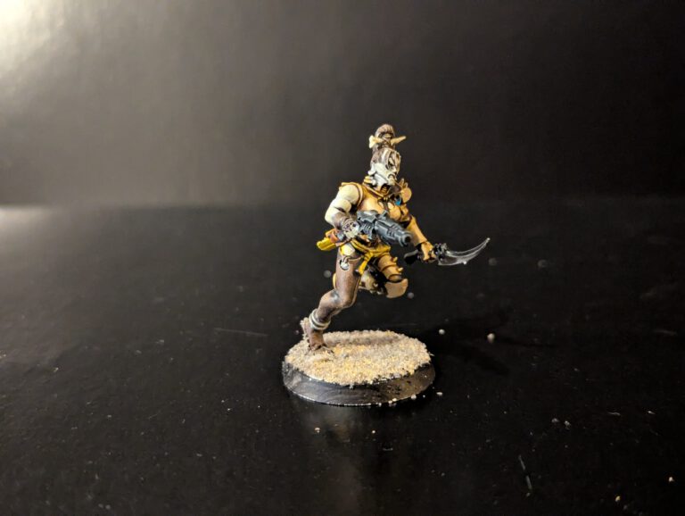 Painted Wych advancing aggressively, viewed from a slightly elevated front angle.