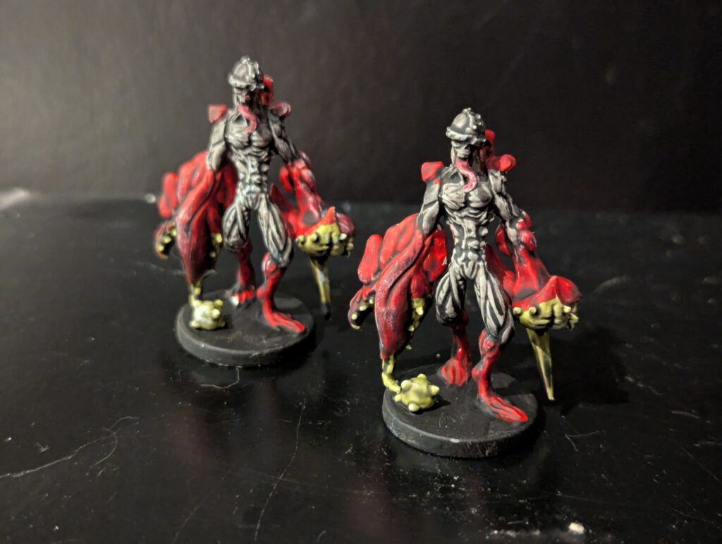 Two Blighted Guardians featuring corroded armor and diseased, glowing green weapon effects.