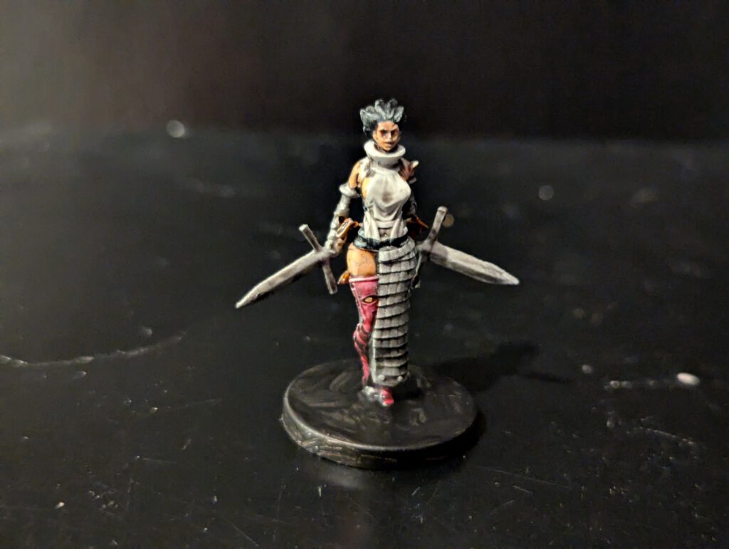 Echo painted with a focus on her white, toned outfit and blades.