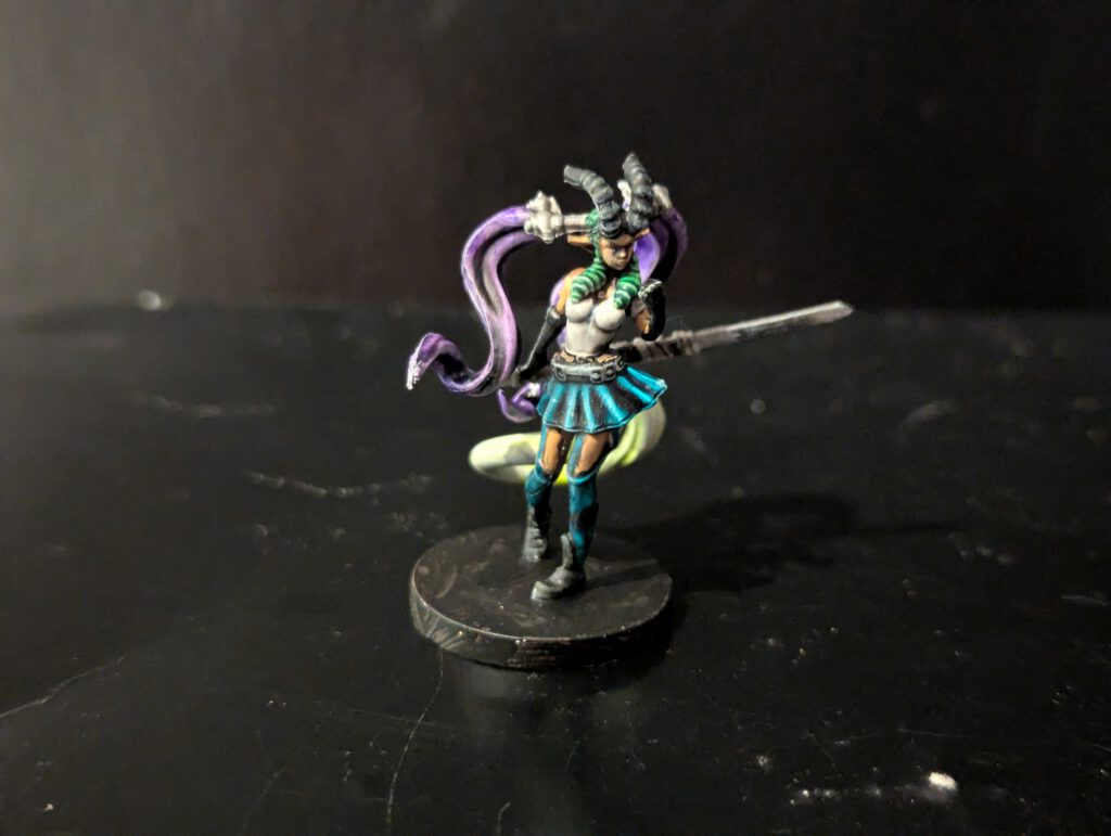 Fully painted Nightingale Arsen hero figure, showcasing her blue and white outfit and katana.