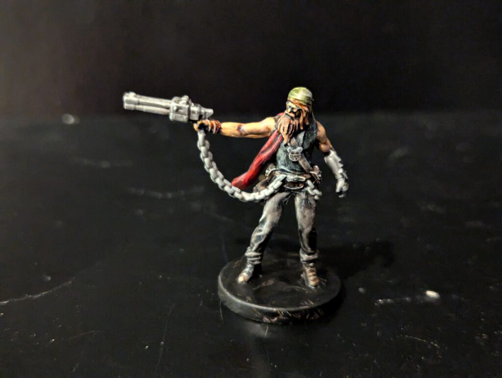 Padric painted with his signature pistol.