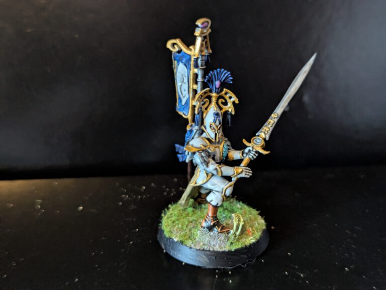 Individual Bladelord in a dynamic pose, highlighting the intricate helmet design and gemstones.