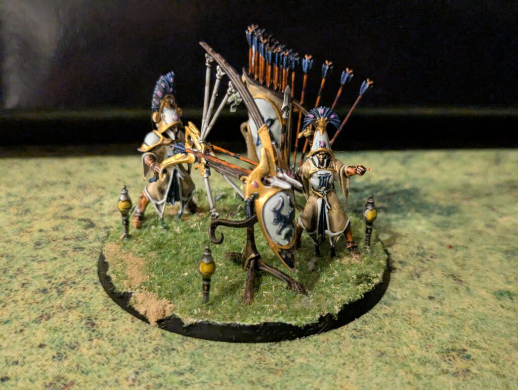 Painted Vanari Starshard Ballista from the Iliathan Warhost, featuring white wood, blue energy accents, and two crew members.