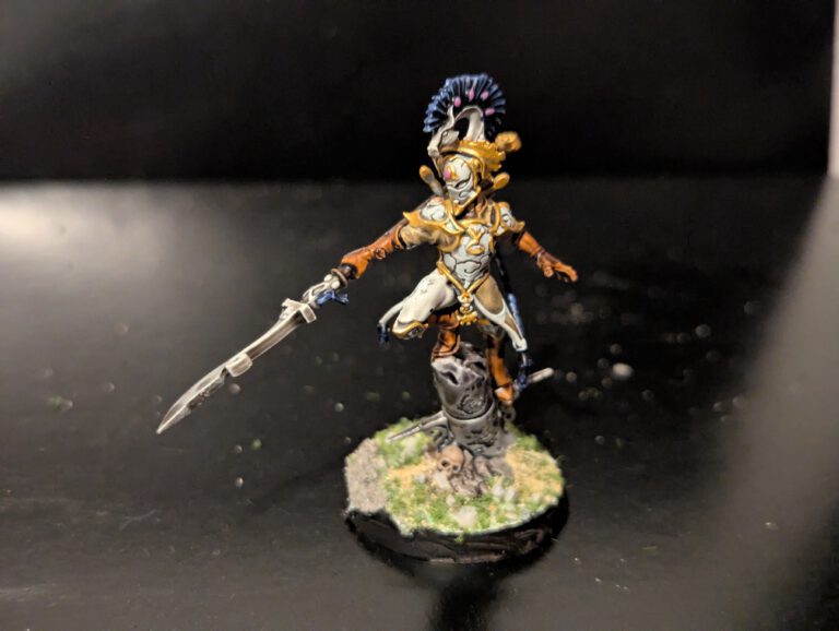 Detailed shot of an individual Ydrilan Riverblade miniature from the Iliathan Warhost, showcasing the movement and clean blue-to-white transitions.