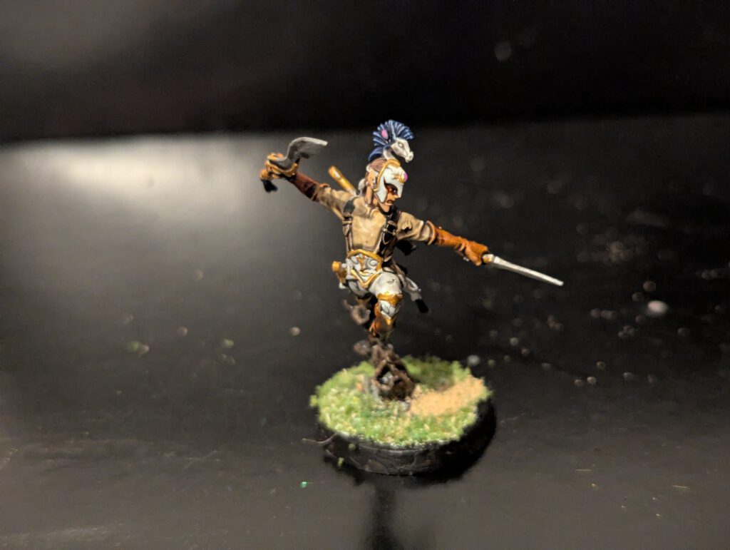 Detailed shot of an individual Ydrilan Riverblade miniature from the Iliathan Warhost, showcasing the movement and clean blue-to-white transitions.