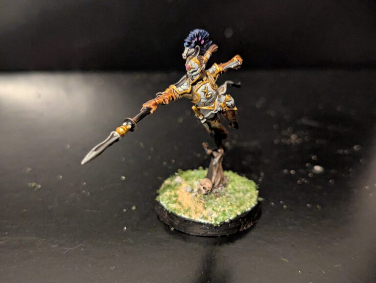 Detailed shot of an individual Ydrilan Riverblade miniature from the Iliathan Warhost, showcasing the movement and clean blue-to-white transitions.