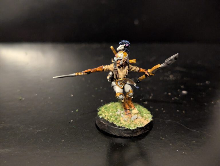 Detailed shot of an individual Ydrilan Riverblade miniature from the Iliathan Warhost, showcasing the movement and clean blue-to-white transitions.