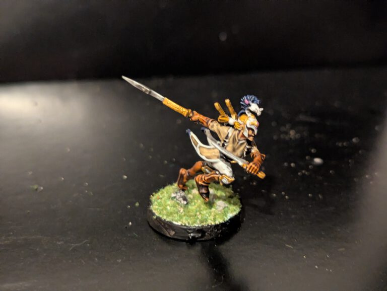 Detailed shot of an individual Ydrilan Riverblade miniature from the Iliathan Warhost, showcasing the movement and clean blue-to-white transitions.