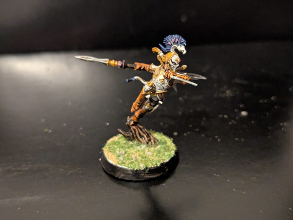 Detailed shot of an individual Ydrilan Riverblade miniature from the Iliathan Warhost, showcasing the movement and clean blue-to-white transitions.