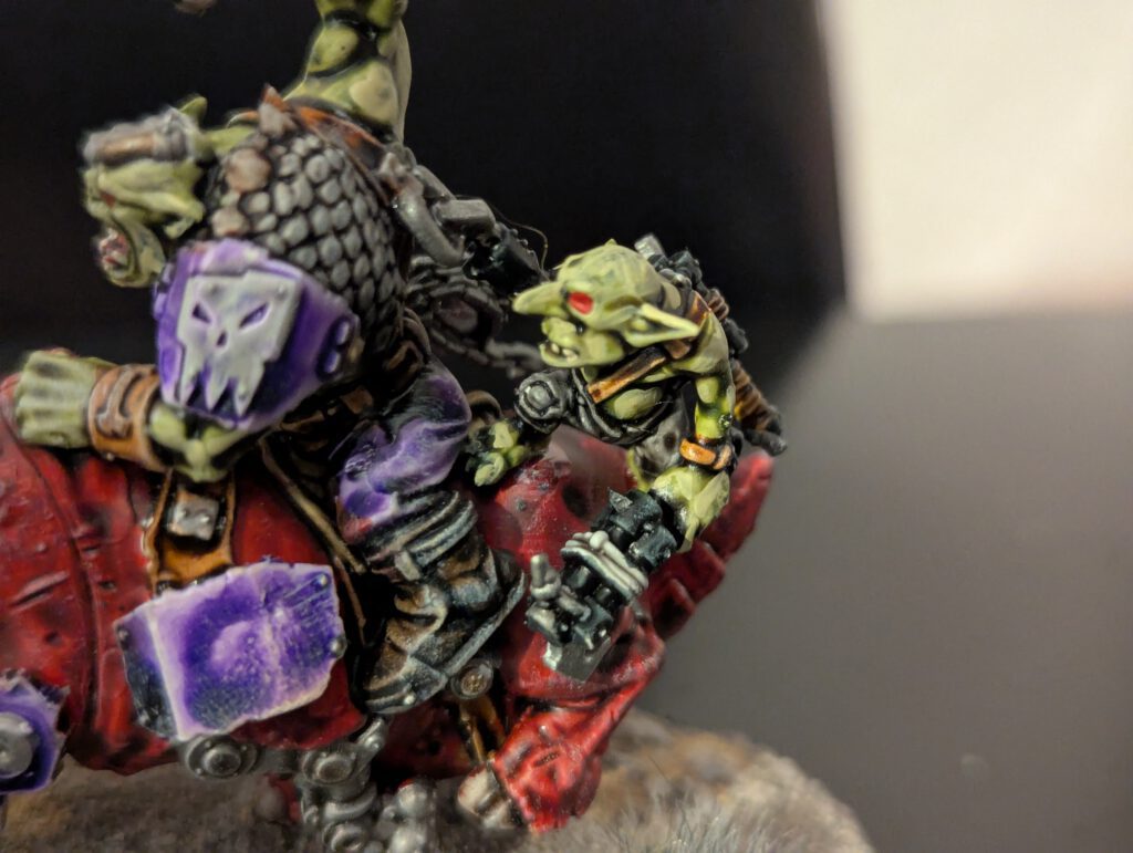 Detail shot of the Grot helper clinging to the back of the Squighog.