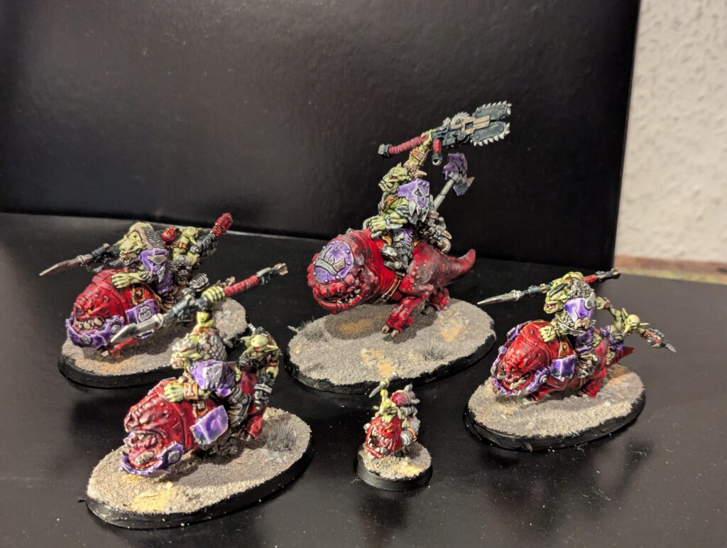 A complete unit of 5 painted Orks Squighog Boyz including the Nob on Smasha Squig and Bomb Squig.