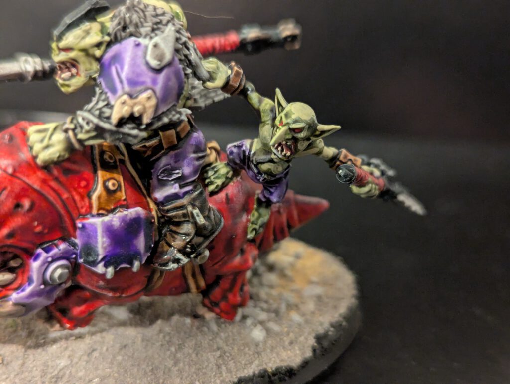 Rear perspective focusing on the Grot passenger.