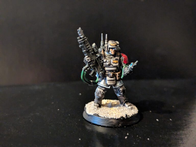 Kasrkin shock trooper in a dynamic stance, featuring clean visor lens highlights.