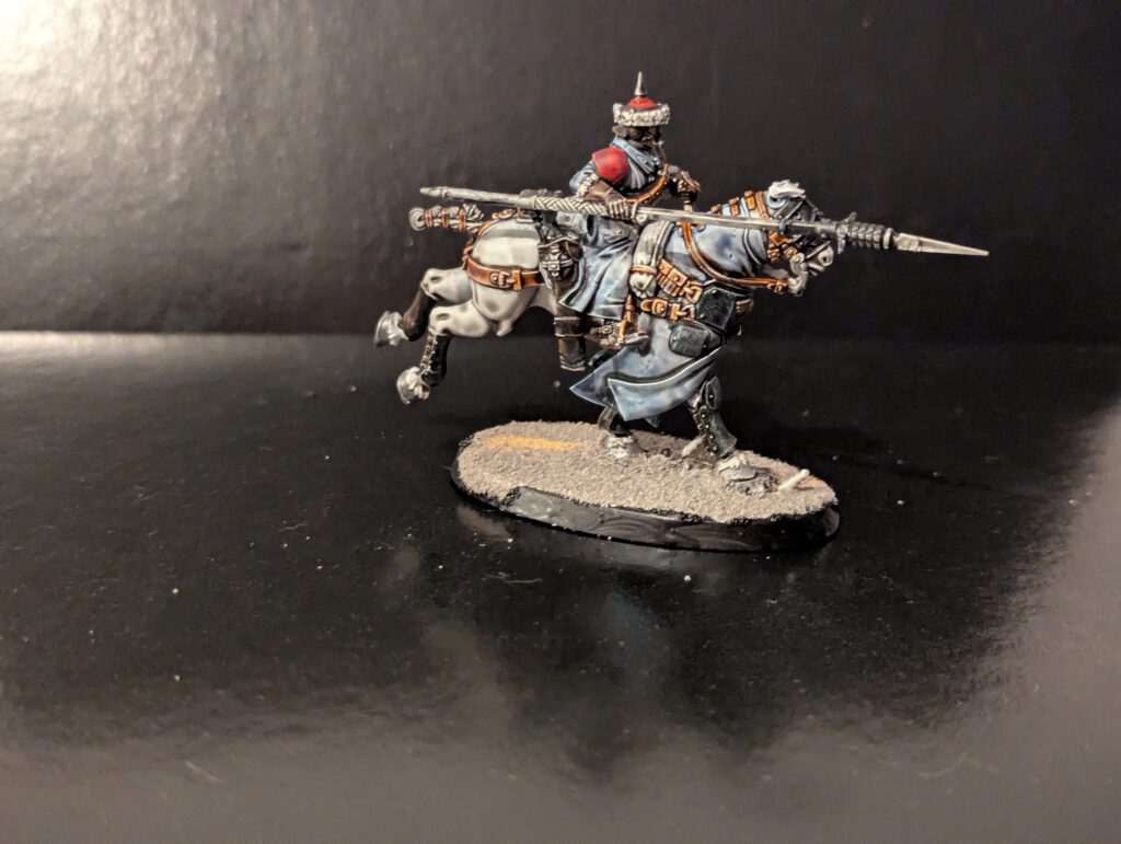 Painted Rough Rider trooper mounted on a striking white horse, showcasing smooth white fur shading.