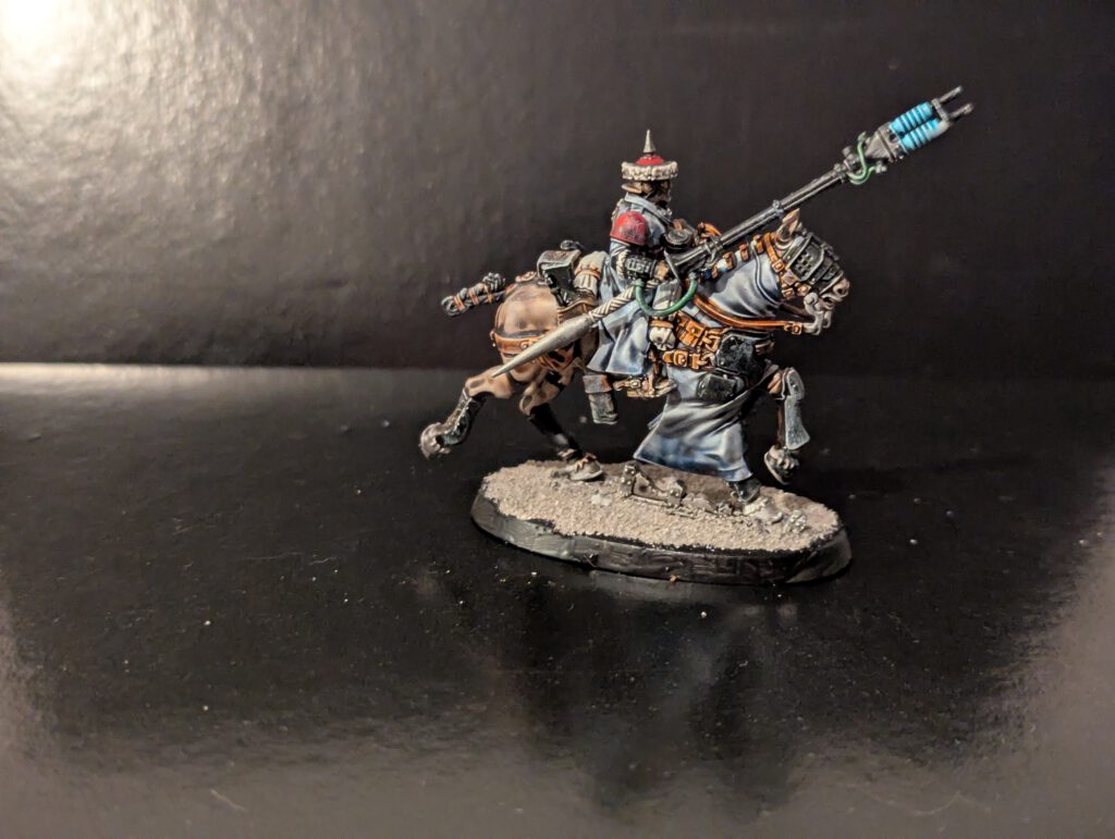 Mounted Imperial Guard trooper wielding an explosive goad lance, featuring detailed leather reins and saddlebags.